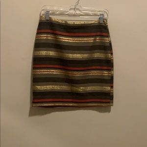 Striped pencil skirt. Gold